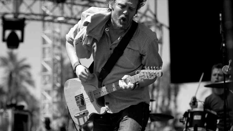 Glen Hansard performs as part of the Irish band, The Frames.