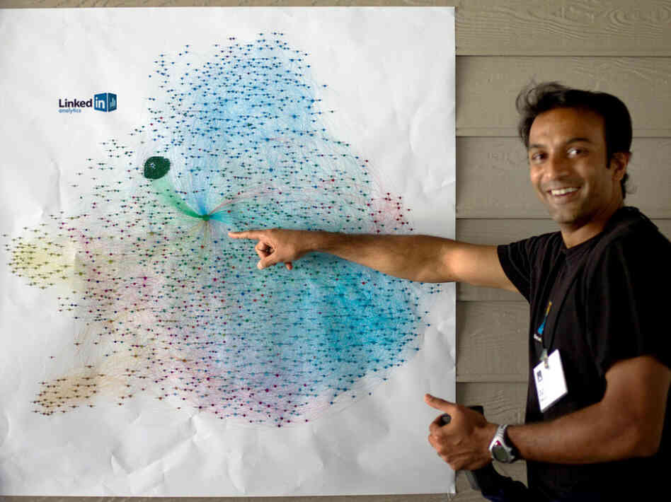 DJ Patil explains a visualization of a person's LinkedIn network, where different groups of contacts are illustrated by different colors. Patil developed big data projects for LinkedIn — like algorithms to determine whom you might know. He now recruits mathematicians for a venture capital firm.