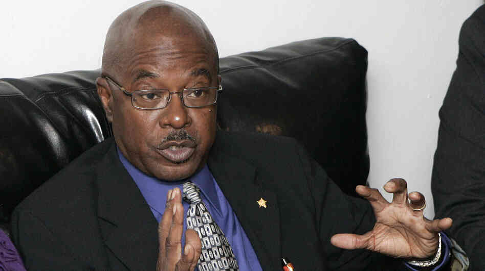 Julian White, former director of Florida A&M University's famed Marching 100 band, speaks at a news conference in Tallahassee, Fla. 