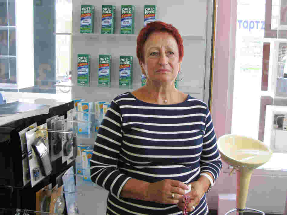 In Volos, optician Klita Dimitriadis accepts partial payment in Local Alternative Units, or TEMs. She then spends the TEMs at a monthly farmers market, or exchanges them for other services.