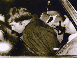 John Hinckley Jr. is escorted by police in Washington, D.C., on March 30, 1981, following his arrest after shooting and seriously wounding then-President Ronald Reagan. John Hinckley Jr. is escorted by police in Washington, D.C., on March 30, 1981, following his arrest after shooting and seriously wounding then-President Ronald Reagan.