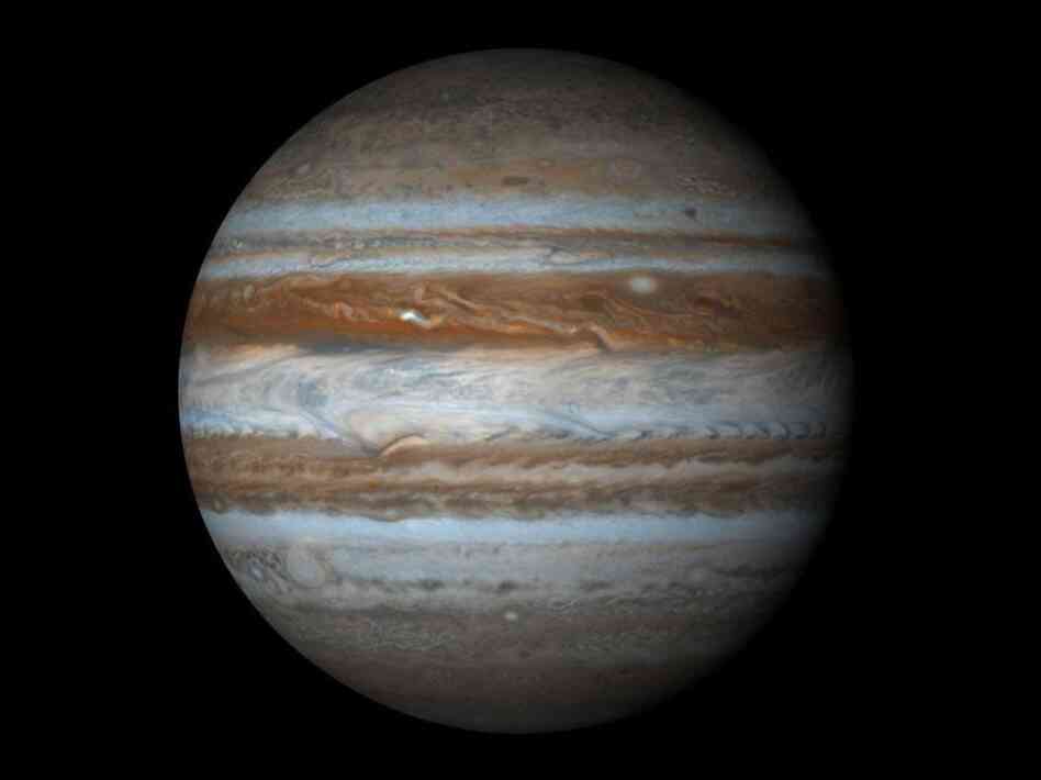 Displayed as a proper sphere, Jupiter shines like a jewel in the night, a giant pillar of color and power that towers above everything in solar system besides the sun itself.
