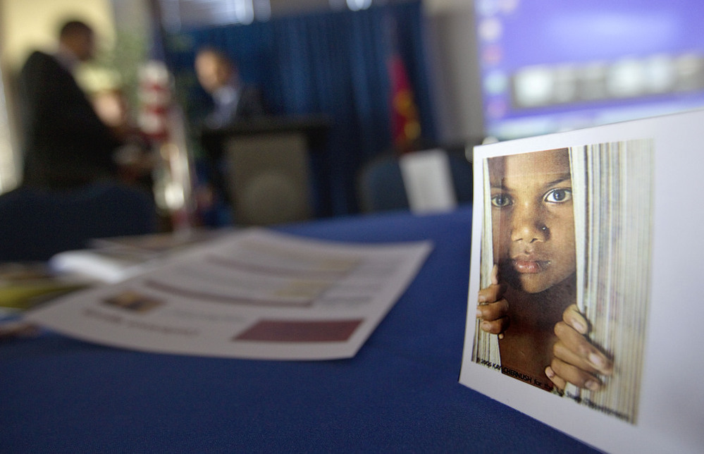 A placard of a child sits on a table during a conference Oct. 31 on human sex trafficking in Atlanta. The Georgia Department of Education estimates that about 5,000 girls in the state are at risk for trafficking each year. 