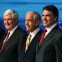 From left, GOP presidential candidates Newt Gingrich, Ron Paul, Rick Perry and Mitt Romney participate in the Fox News/Google GOP debate at the Orange County Convention Center in September. Since then, the candidates have gotten tougher on each other.