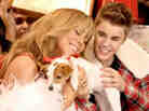 A screenshot from the Justin Bieber/Mariah Carey video, "All I Want For Christmas Is You."