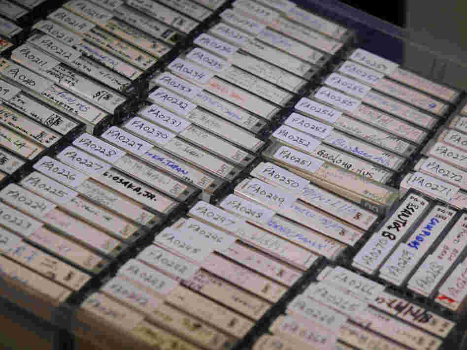 A few of the hundreds of tapes recorded on the road by Fugazi's sound engineers.