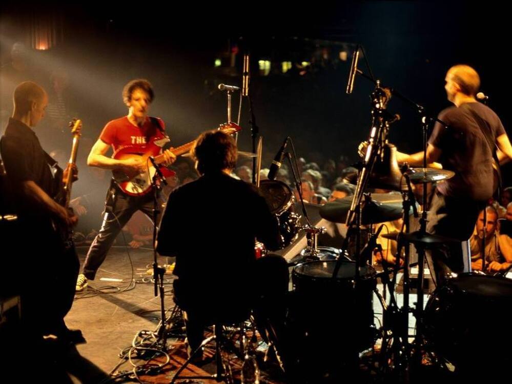 Fugazi on stage in 2000.