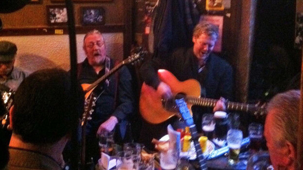 Glen Hansard sits in with a group of traditional Irish musicians at the Dublin pub O'Donoghues.