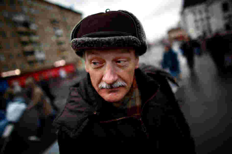 Sergei Tarkhov, a geology professor and Trans-Siberian veteran, stands near the zero kilometer mark at Yaroslavsky Rail Station in Moscow. 