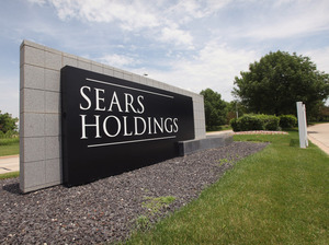 Sears Holding Corp., parent company to Sears and Kmart, is considering a move from its corporate headquarters after a tax incentive package failed to pass the state House of Representatives. More than 6,000 employees work at the Hoffman Estates, Ill., campus. Sears Holding Corp., parent company to Sears and Kmart, is considering a move from its corporate headquarters after a tax incentive package failed to pass the state House of Representatives. More than 6,000 employees work at the Hoffman Estates, Ill., campus.
