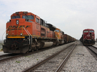 A BNSF train delivers coal. A BNSF train delivers coal.