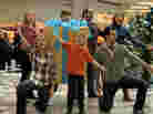 The cast of Improv Everywhere's "Mall Santa Musical."