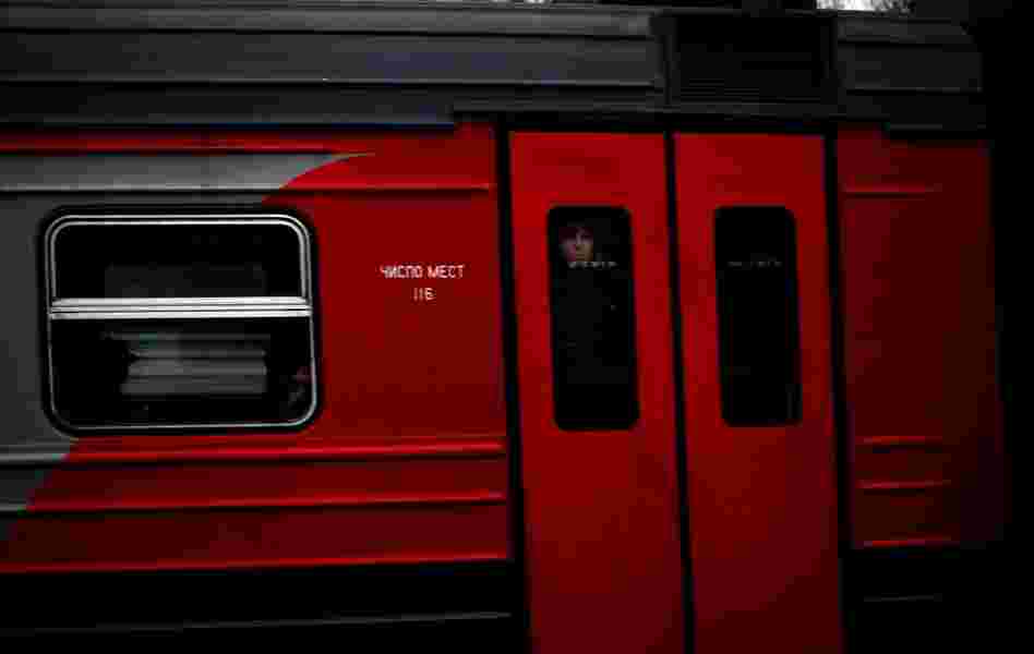 Trains pass each other along the rail line.