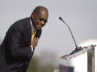 Herman Cain bows to the crowd during his announcement Saturday that he's suspending his campaign. Herman Cain bows to the crowd during his announcement Saturday that he's suspending his campaign.