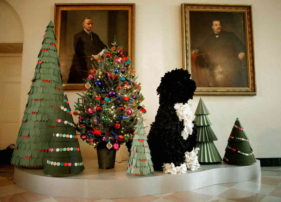 Several versions of the Obamas' Portuguese water dog, Bo, appear throughout this year's decorations, ranging from a miniature licorice and marshmallow version to a this 4½-foot-tall felt topiary. 