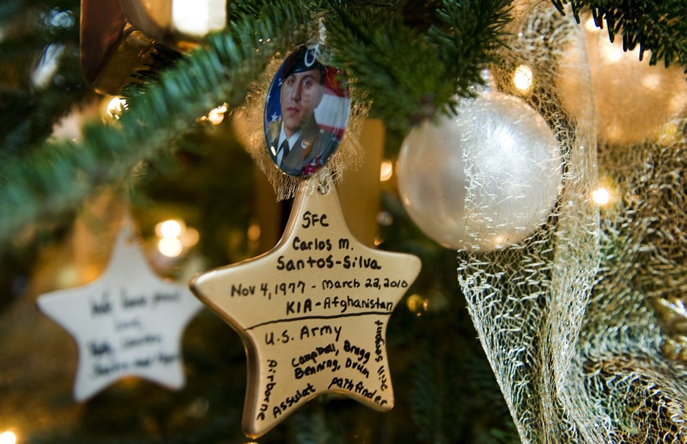 Ornaments made to honor loved ones decorate the Gold Star Families Tree. 