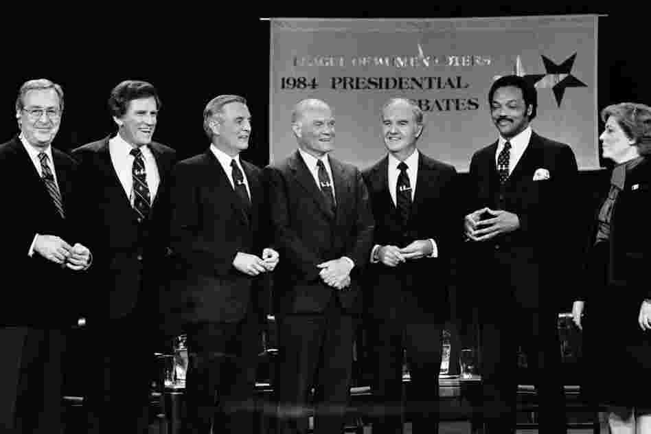 McGovern (third from right) ran for president again in 1984. He conceded his race to Democratic nominee Walter Mondale (third from left). Here, moderator John Chancellor (left) stands with five of the candidates for the Democratic nomination prepare a debate.
