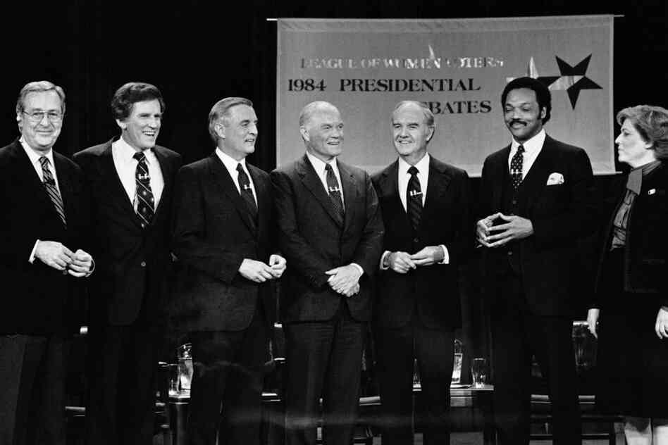 McGovern (third from right) ran for president again in 1984. He conceded his race to Democratic nominee Walter Mondale (third from left). Here, moderator John Chancellor (left) stands with five of the candidates for the Democratic nomination prepare a debate.