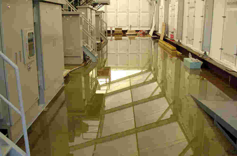 This handout picture, taken by Tokyo Electric Power Co (TEPCO) shows radioactive water on the floor inside the building of a water treatment facility at TEPCO's Fukushima Daiichi nuclear plant.