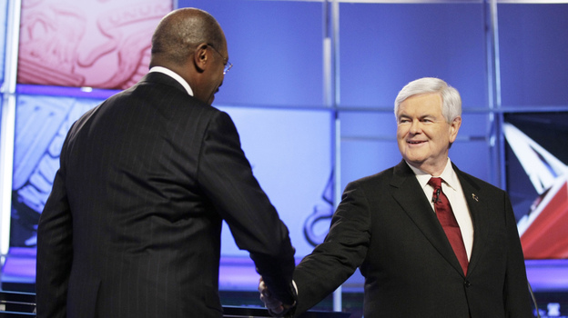 Herman Cain, who has since suspended his presidential campaign, greets Newt Gingrich upon arriving at CNN's GOP National Security debate in Washington on Nov. 22. Herman Cain, who has since suspended his presidential campaign, greets Newt Gingrich upon arriving at CNN's GOP National Security debate in Washington on Nov. 22.