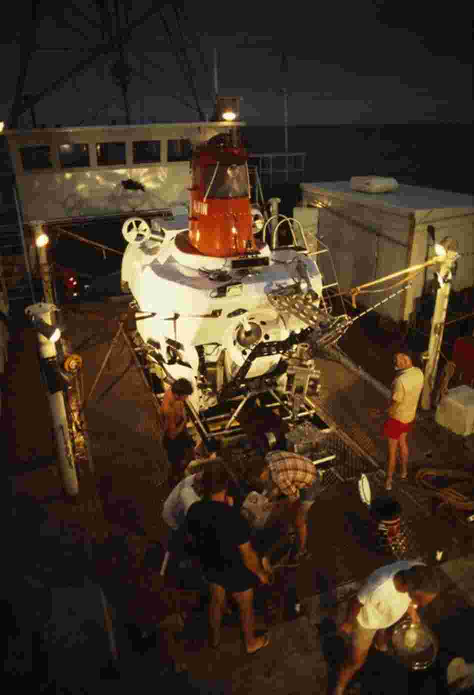 The Alvin, seen here in the 1970s nestled safely aboard its mother ship, Lulu, helped revolutionize ocean science. Built in 1964, the sub could dive nearly three miles deep, making it possible for humans to explore the seafloor. Dives were typically seven to nine hours long. 