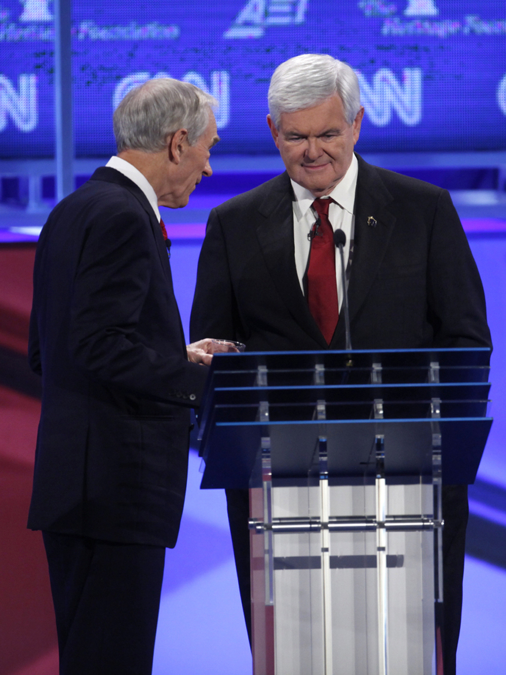 A civil moment that belied the bad vibes between Rep. Ron Paul and Newt Gingrich, Nov. 22, 2011. 