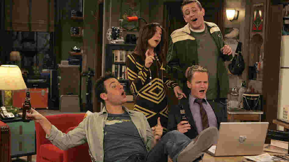 Lily (Alyson Hannigan), Marshall (Jason Segel), Ted (Josh Radnor), and Barney (Neil Patrick Harris, right) on How I Met Your Mother.