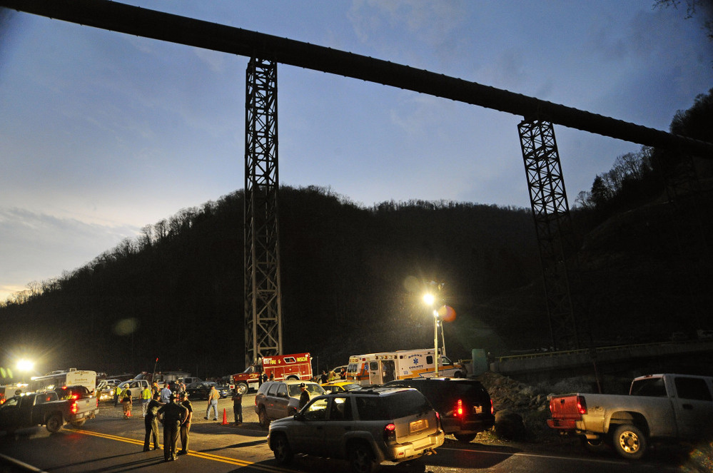  West Virginia State Police direct traffic at the entrance to Massey Energy's Upper Big Branch coal mine in Montcoal, W.Va., after an explosion April 5, 2010. Twenty-nine miners were killed in the blast. 