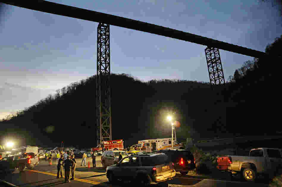  West Virginia State Police direct traffic at the entrance to Massey Energy's Upper Big Branch coal mine in Montcoal, W.Va., after an explosion April 5, 2010. Twenty-nine miners were killed in the blast. 