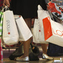 Shoppers look at a display at the Dadeland Mall in Miami on Nov. 25. Princeton professor Sheldon Garon says Americans spend too much and save too little compared to Europeans and Asians. Shoppers look at a display at the Dadeland Mall in Miami on Nov. 25. Princeton professor Sheldon Garon says Americans spend too much and save too little compared to Europeans and Asians.
