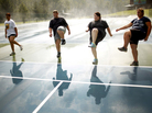 Wellspring students do high steps on the tennis court. Exercise is paramount at Wellspring, and a little rain doesn't get in the way of outdoor activities. Wellspring students do high steps on the tennis court. Exercise is paramount at Wellspring, and a little rain doesn't get in the way of outdoor activities.