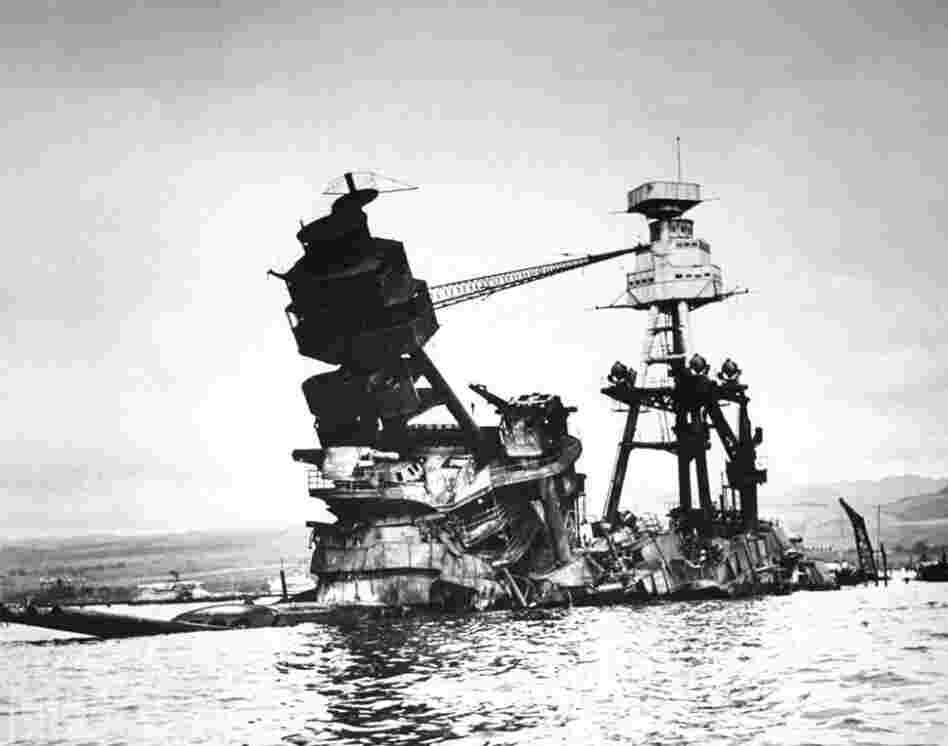 The exposed wreckage of the battleship USS Arizona in 1942; today, most of the ship lies beneath the waves at Pearl Harbor. The exposed wreckage of the battleship USS Arizona in 1942; today, most of the ship lies beneath the waves at Pearl Harbor.