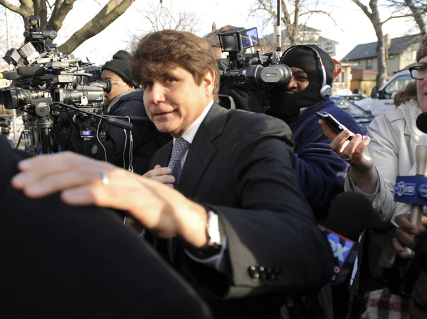 Former Illinois Gov. Rod Blagojevich arrived at his home being sentenced to 14-year prison sentence for a political corruption conviction. 