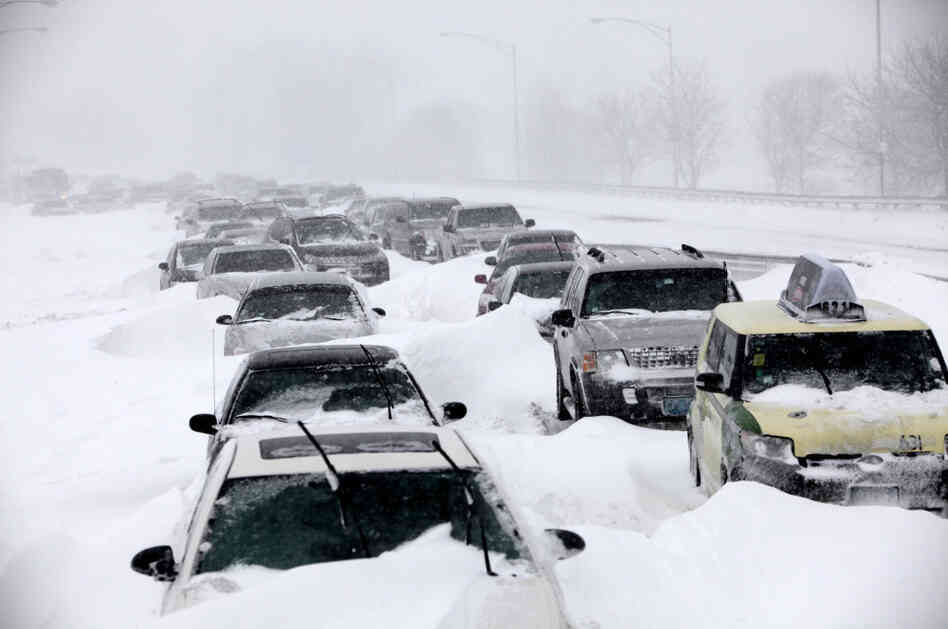 In this Feb. 2 file photo, hundreds of cars are seen stranded on Lake Shore Drive in Chicago after a winter blizzard of historic proportions wobbled an otherwise snow-tough Chicago. 