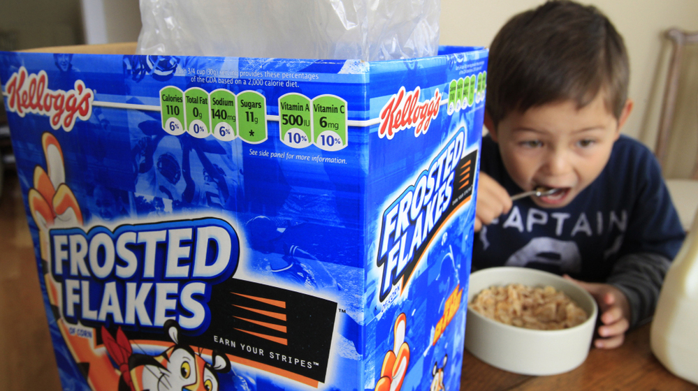 Nathaniel Donaker, 4, eats Kellogg's Frosted Flakes cereal at his home in Palo Alto, Calif. Frosted Flakes is 27 percent sugar, according to a report by the Environmental Working Group.