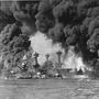 The battleships USS West Virginia and USS Tennessee burn in Pearl Harbor after the Japanese air attack on Dec. 7, 1941. The battleships USS West Virginia and USS Tennessee burn in Pearl Harbor after the Japanese air attack on Dec. 7, 1941.