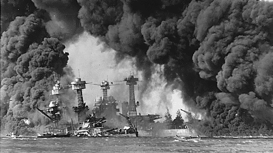 The battleships USS West Virginia and USS Tennessee burn in Pearl Harbor after the Japanese air attack on Dec. 7, 1941.
