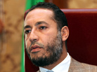 Saadi Gadhafi at January 2010 news conference in Tripoli. Saadi Gadhafi at January 2010 news conference in Tripoli.