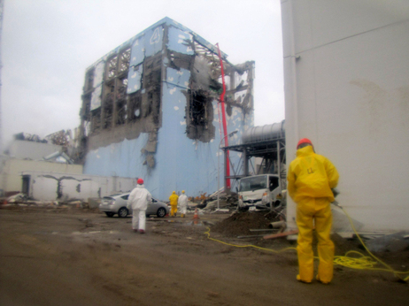This file handout picture shows workers spraying water to cool down the spent nuclear fuel in the fourth reactor building at TEPCO's Fukushima Daiichi nuclear power plant. This file handout picture shows workers spraying water to cool down the spent nuclear fuel in the fourth reactor building at TEPCO's Fukushima Daiichi nuclear power plant.