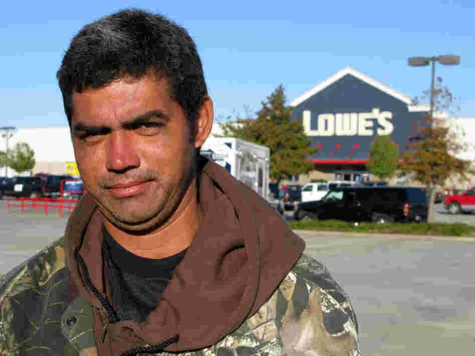 Day laborer Yohanni Castillo from Honduras waits for work outside a Lowes home improvement store in New Orleans. Jobs are drying up, he says, and he hasn't worked in four days. Even when work does comes along, he says, he doesn't always get paid.