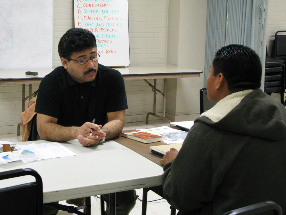 Methodist Pastor Oscar Ramos conducts English classes for Latino immigrants in New Orleans. The majority of the immigrants say they arrived after Katrina to work in construction and intend to stay.