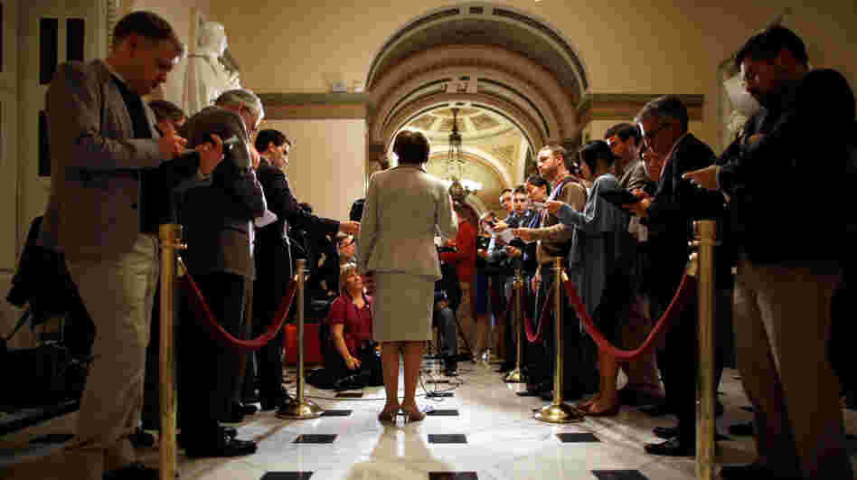 House Minority Leader Rep. Nancy Pelosi talks to reporters in the U.S. Capitol on Friday. Pelosi was critical of Speaker John Boehner and the GOP leadership for recessing the House without passing extensions of the payroll tax cut and unemployment benefits, both set to expire at the end of the year.