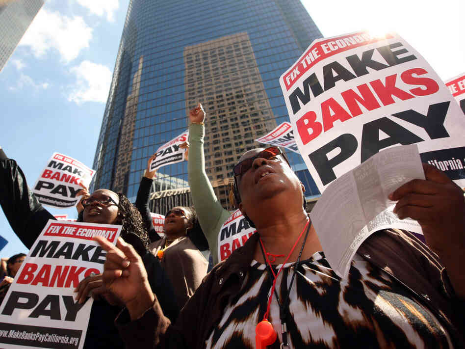 LOS ANGELES, CA - OCTOBER 6: Protesters march on downtown banks in Los Angeles, California. (Photo by David McNew/Getty Images)