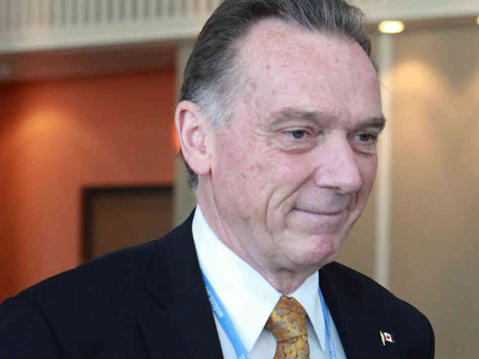 Canadian Environmental Affairs Minister Peter Kent leaves a closed-door meeting on the final day of negotiations of the United Nations Framework Convention on Climate Change (UNFCCC) in Durban on Saturday.