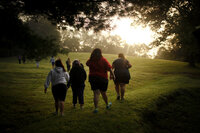 Savannah Davis (second from right) walks with her friends to the cafeteria. In the five years of its existence, Wellspring has earned a reputation for teaching overweight children to prefer healthful food and exercise.