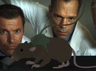 Scientists observe an unusually animated test subject in a re-enactment from Addiction Incorporated. Scientists observe an unusually animated test subject in a re-enactment from Addiction Incorporated.