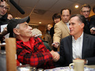 Mitt Romney greets Vietnam War veteran Bob Garon during a campaign stop at the Chez Vachon Restaurant on Monday in Manchester, N.H., where Garon, who is gay, questioned Romney about his position on gay marriage. Mitt Romney greets Vietnam War veteran Bob Garon during a campaign stop at the Chez Vachon Restaurant on Monday in Manchester, N.H., where Garon, who is gay, questioned Romney about his position on gay marriage.