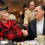 Mitt Romney greets Vietnam War veteran Bob Garon during a campaign stop at the Chez Vachon Restaurant on Monday in Manchester, N.H., where Garon, who is gay, questioned Romney about his position on gay marriage. 