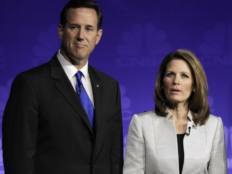 Republican presidential candidates former Pennsylvania Sen. Rick Santorum and Rep. Michele Bachmann, R-Minn., are seen before a Republican presidential debate at Oakland University in Auburn Hills, Mich., Wednesday, Nov. 9, 2011. 