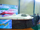 A picture released by the official website of Iran's Revolutionary Guards on December 8, 2011 shows Iranian Revolutionary Guard, Brig. Gen. Amir-Ali Hajizadeh (R) looking at what Iranian officials claim is a U.S. RQ-170 Sentinel high-altitude reconnaissance drone that crashed in Iran on December 4. A picture released by the official website of Iran's Revolutionary Guards on December 8, 2011 shows Iranian Revolutionary Guard, Brig. Gen. Amir-Ali Hajizadeh (R) looking at what Iranian officials claim is a U.S. RQ-170 Sentinel high-altitude reconnaissance drone that crashed in Iran on December 4.
